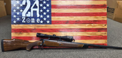 Winchester Model 70 XTR, Bolt Action, .243 Winchester, made in new haven, conn., Leupold 3×9 magnification scope, leupold scope mount, special edition black, white, and wood grain stock, OEM buttpad, 24.5″ Barrel