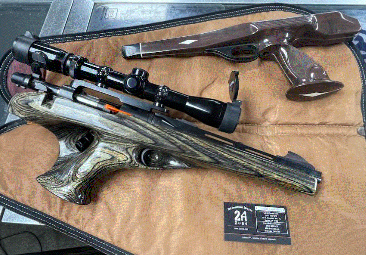 Remington, XP-100, Bolt Action Pistol, .221 Rem Fireball, Weaver scope mount, Burris 2.5x-7x scope, Original Brown, white, and black stock, aftermarket green lacquered wood stock, 11.75" barrel, OEM leather case, fin front iron sight.