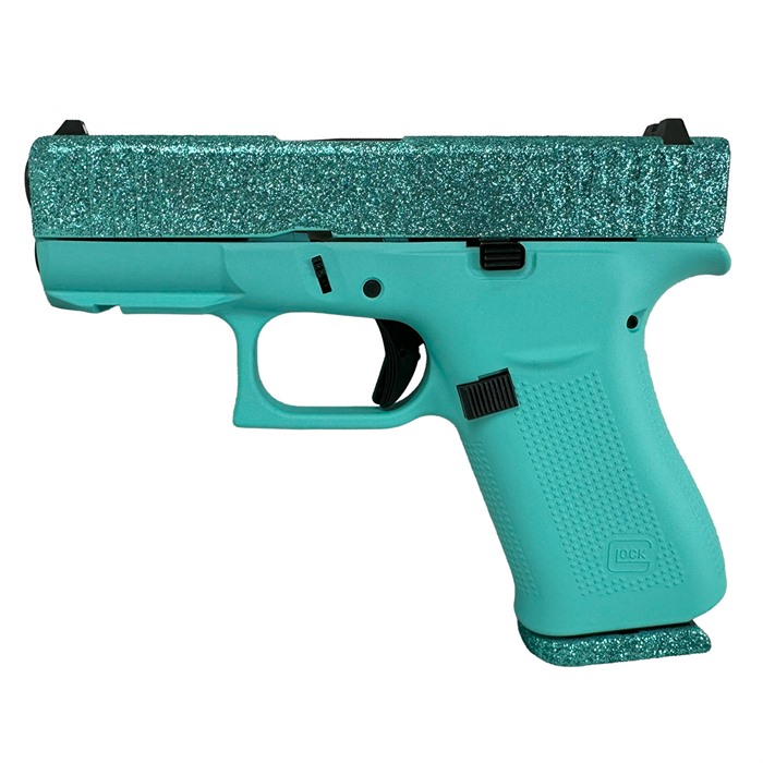 43X CUSTOM 9MM LUGER MALIBLUE SEMI-AUTO HANDGUN W/FRONT RAILS GLOCK 43X 9MM LUGER 3.41” BBL (2)10RD MAGS GLITTER MALIBLUE 43X CUSTOM 9MM LUGER MALIBLUE SEMI-AUTO HANDGUN W/FRONT RAILS GLOCK 43X 9MM LUGER 3.41” BBL (2)10RD MAGS GLITTER MALIBLUE