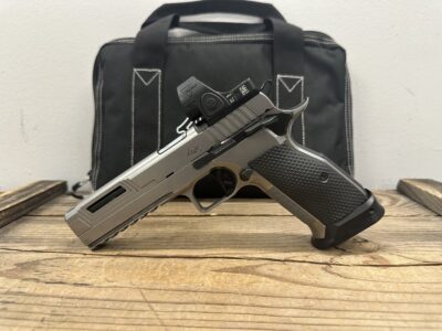Dan Wesson, DWX, Single Action Only, Semi-automatic, Metal Frame Pistol, Full Size, 9MM, 4.95″ Match Grade Barrel, DLC Finish, Silver, Aluminum Grips, Red, Optics Ready Slide, Ambidextrous Safety, Fiber Front & Adjustable Rear Sights, Flat K Style Trigger, 12 Extra Magazines, Trijicon SRO Included