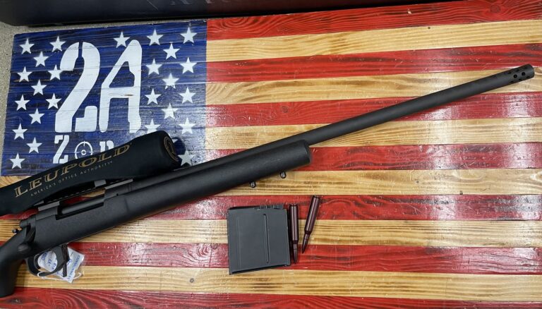 Remington, Model 700 Police MLR, 338Lapua, 26inch ported barrel,Bolt action, Black, Leupold VX3L scope, 1 magazine, no lock Remington, Model 700 Police MLR, 338Lapua, 26inch ported barrel,Bolt action, Black, Leupold VX3L scope, 1 magazine, no lock