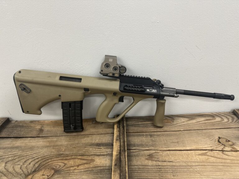 Steyr AUG A3 M1, 5.56 NATO, 16″ Barrel, Tan Bullpup Stock, Picatinny Rail, EOTech EXPS3-0 Holographic Sight Steyr AUG A3 M1, 5.56 NATO, 16″ Barrel, Tan Bullpup Stock, Picatinny Rail, EOTech EXPS3-0 Holographic Sight