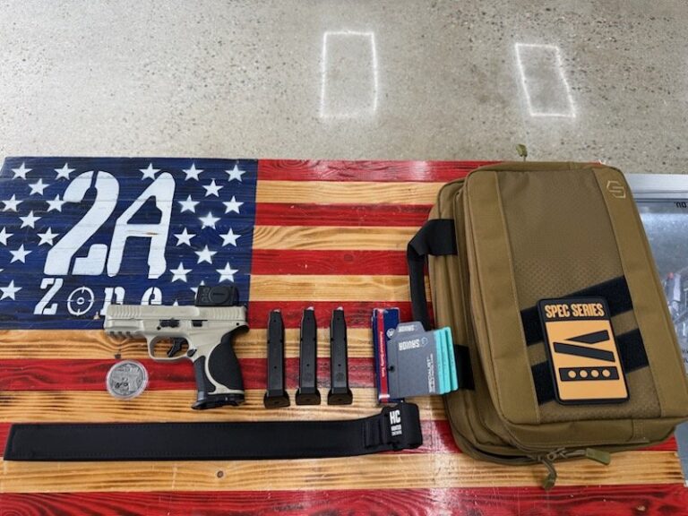 Smith & Wesson M&P9 M2.0 Spec Series, 9mm, 4″ Barrel, Champagne, Semi Auto, Aimpoint Acro, 3 Magazines, Hunter Constantine Belt, Knife, Challenge Coin, Savior Bag, OEM Box, OEM Lock
