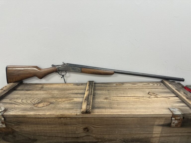 Iver Johnson Champion, 12 Gauge, Single-Shot Shotgun, Break-Action, Exposed Hammer, Case-Hardened Receiver, Blued Steel Barrel, Fixed Wood Stock, Bead Front Sight Iver Johnson Champion, 12 Gauge, Single-Shot Shotgun, Break-Action, Exposed Hammer, Case-Hardened Receiver, Blued Steel Barrel, Fixed Wood Stock, Bead Front Sight